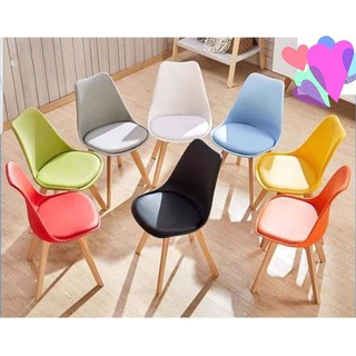 bàn gỗ cao su và 4 ghế eames đệm da