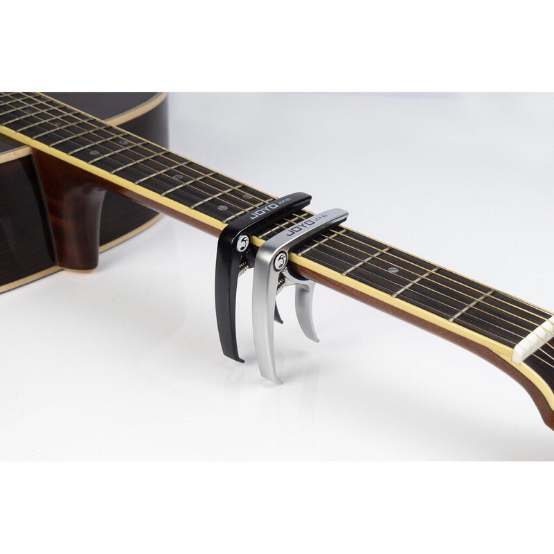 Capo guitar - ukulele JX-05 (Thêm chức năng chốt nhổ dây)