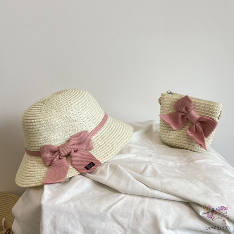 Set mũ vành và túi xách đan cói đính nơ thời trang mùa hè đáng yêu cho bé gái