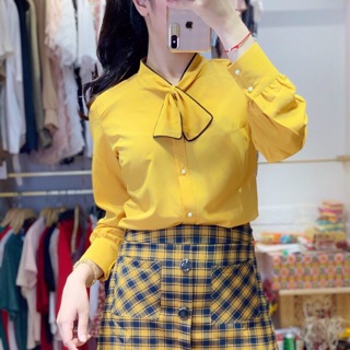 Áo sơ mi nữ cổ nơ xinh lắm (ảnh shop tự chụp)