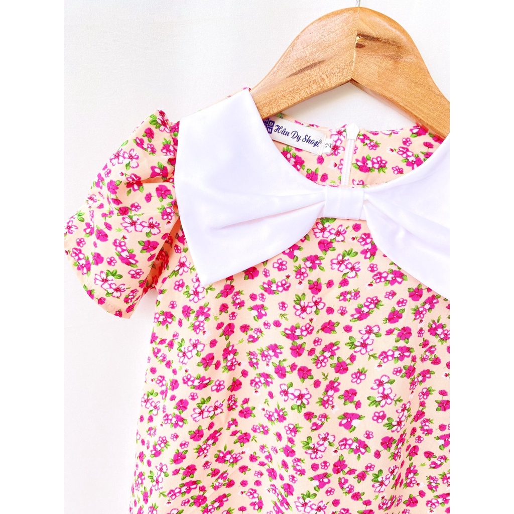 Váy A chất linen gân mặc sang cổ tròn đính nơ ngắn tay có túi