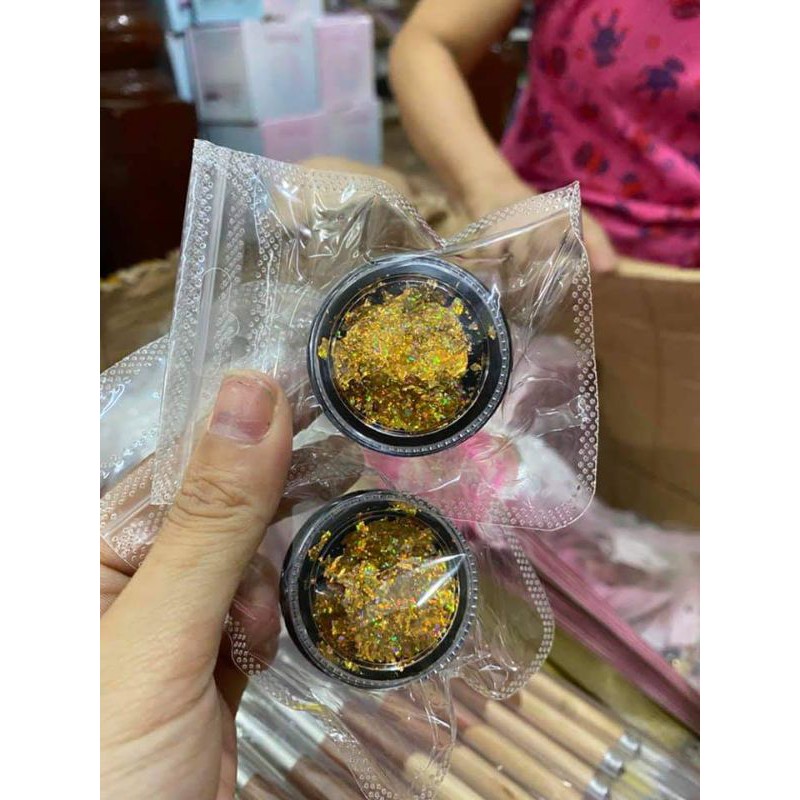 giấy nhún ẩn móng màu bạc ,  vàng