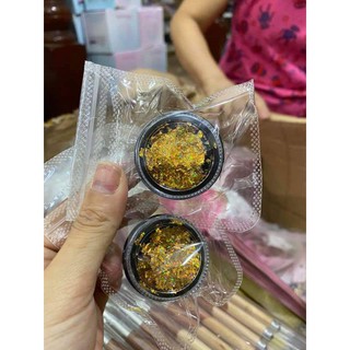 giấy nhún ẩn móng màu bạc ,  vàng
