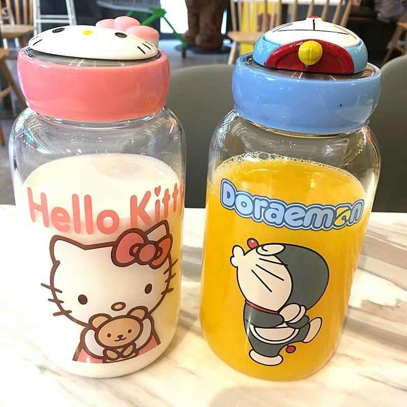 Bình Nước Doraemon, Bình Nước Hello Kitty Kèm Túi 600ML Cực Xinh