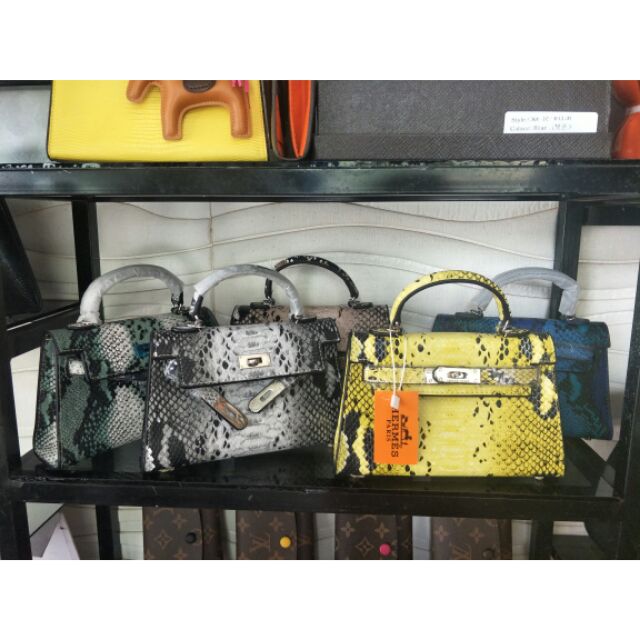 Túi hm vân da rắn loang đủ màu sale 200k