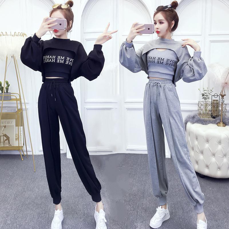 Bộ đồ thể thao ba mảnh phụ nữ rộng rãi Hàn Quốc quần ống lửng mùa xuân và hè thời trang áo len không đều vest hợp