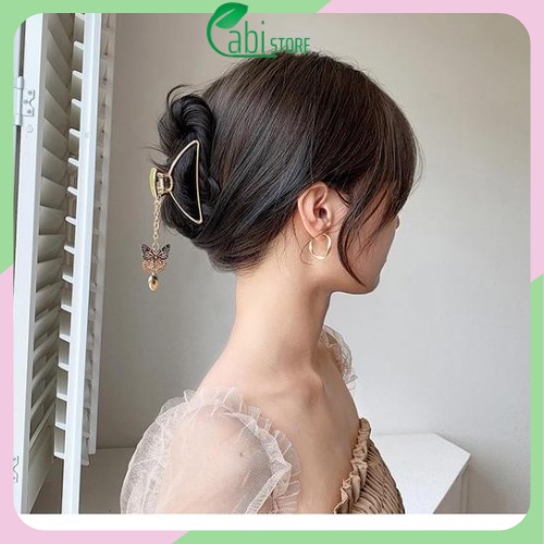 Kẹp tóc càng cua hình bướm gắn dây tua rua phong cách Hàn Quốc dành cho nữ.