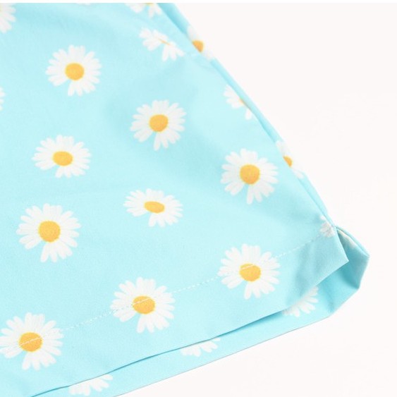 Quần đùi xanh nhiều hoa cúc daisy