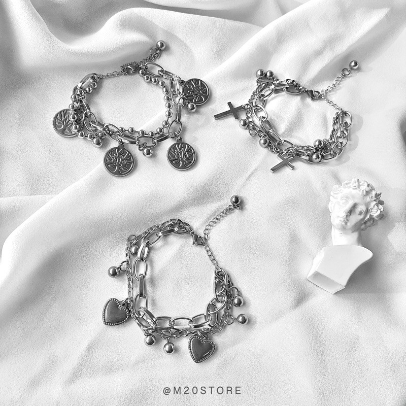 Vòng tay 2 layer, có 3 loại charm hình cây, trái tim, thánh giá.