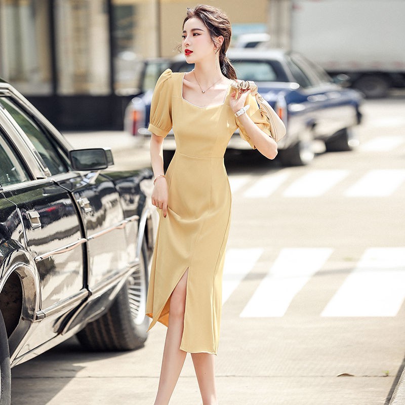 Pháp retro niche bong bóng tay áo vuông cổ tính khí váy dài xẻ tà màu vàng nữ 2021 mùa hè phong cách mới