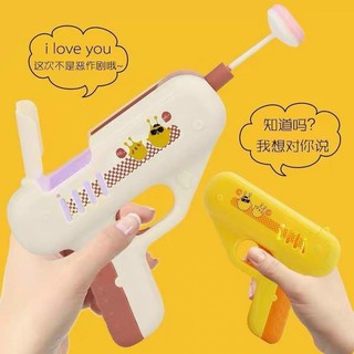 Súng bắn kẹo mút
