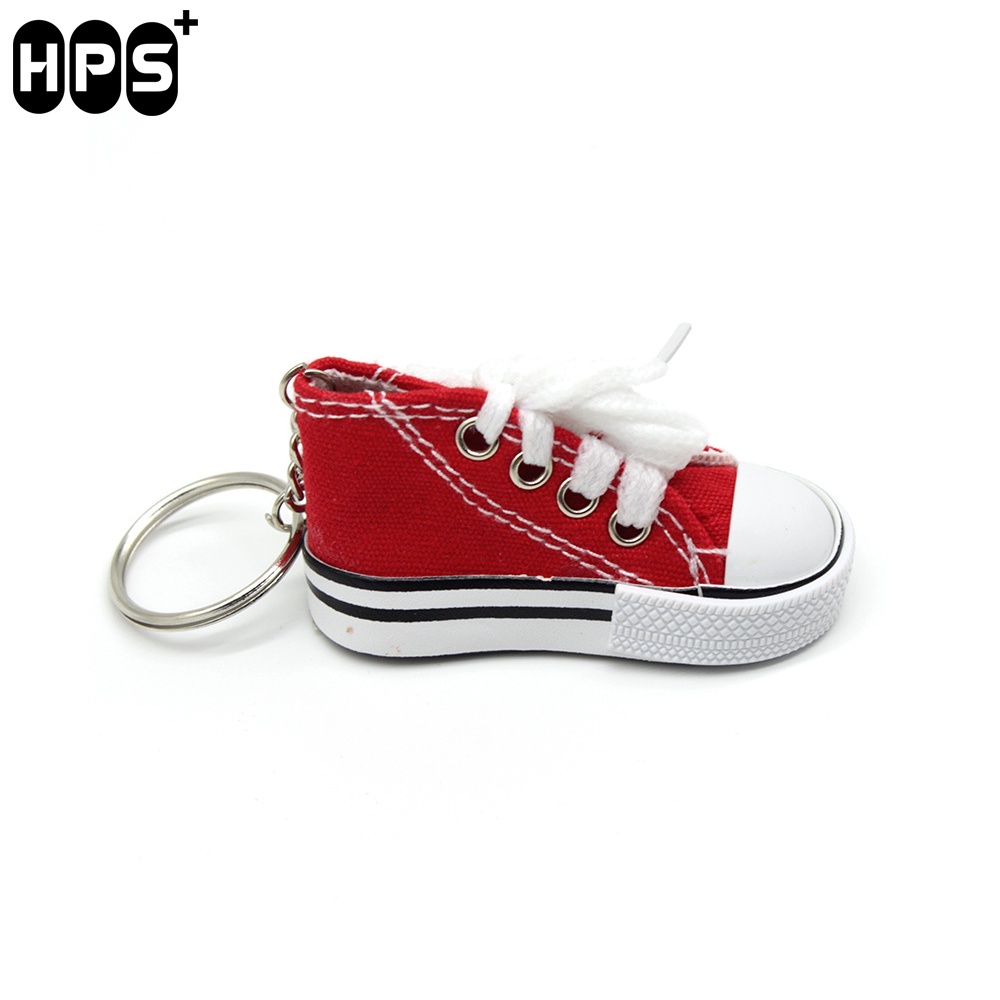 Vỏ bọc chân chống xe máy hình giày thể thao mini vui nhộn