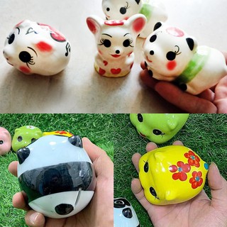 Quà tặng 1 heo đất mini hút tiền (mẫu random) cho khách hàng mua sản phẩm ấm tách Ninh Giang.