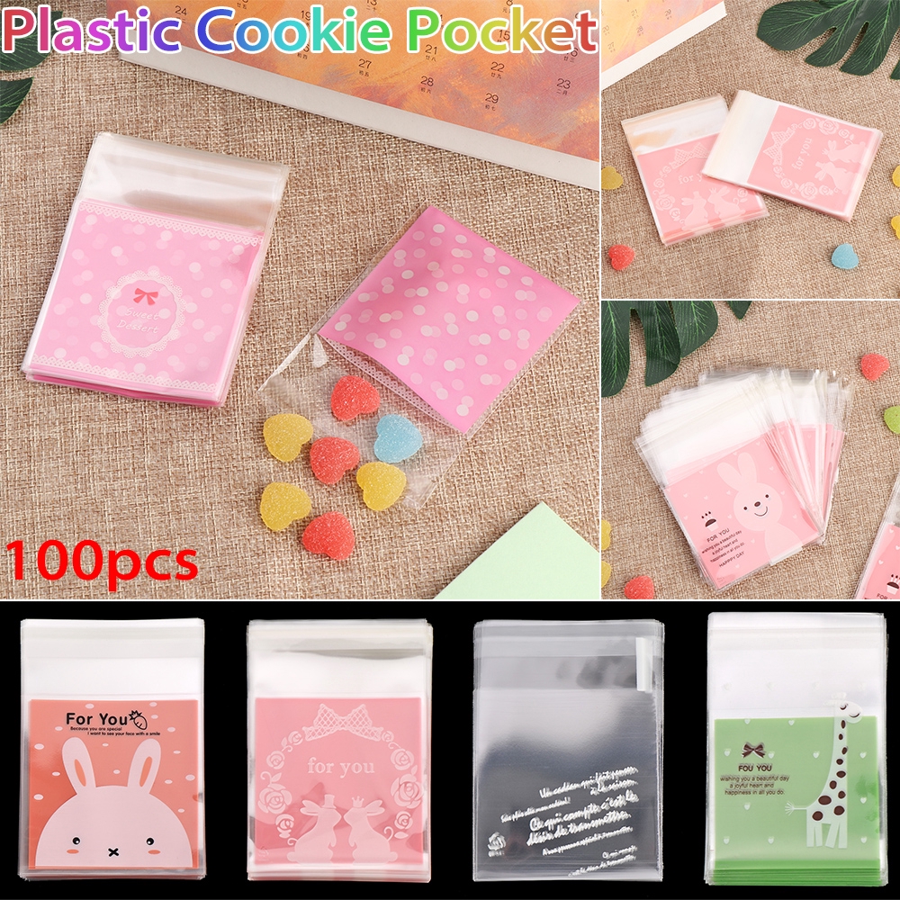 Bộ 100 túi dán đựng kẹo/bánh quy bằng nhựa họa tiết hoạt hình dùng để gói quà dự tiệc
