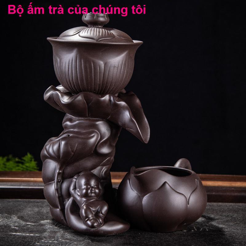 bàn học gấp gọnMáy xay đá cát tím Nước tự động Xả Ấm trà Tách Kung Fu Bộ Sáng tạo một chiếc bình nghệ thuật Lư