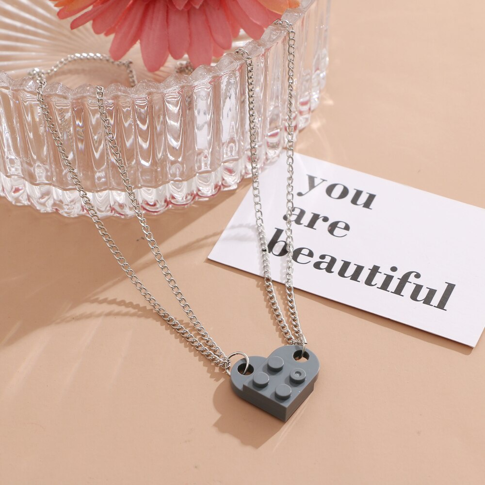 Set 2 vòng cổ mặt mảnh ghép lắp ráp hình trái tim cho cặp đôi