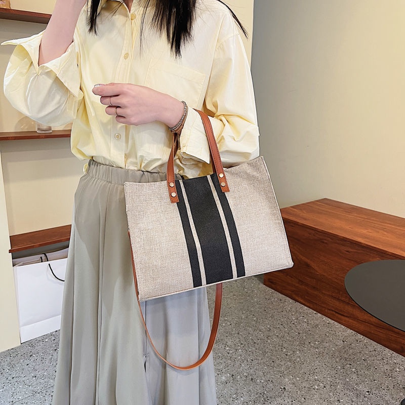 2022 new Korean style ins style women's portable briefcase OL professional commuting simple fashion single shoulder crossbody canvas large bag