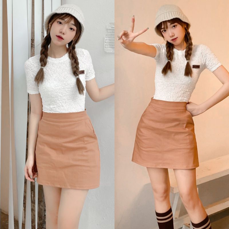 ÁO XỐP NHÚN CỔ TRÒN CHÂN VÁY CHỮ A MÀU NÂU