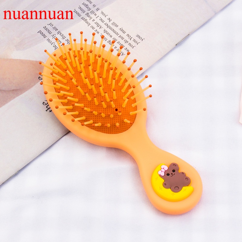 Lược nhựa chải tóc mát xa da đầu có gương trang điểm tiện lợi