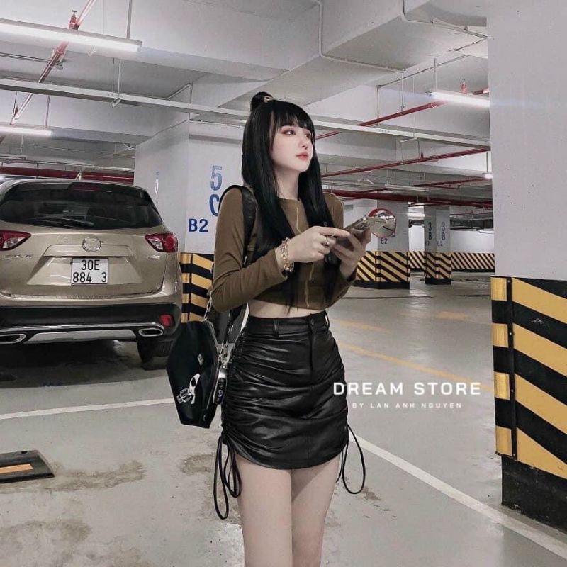 Chân váy da rút dây 2 bên có may kèm quần