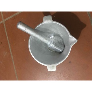 cối chày bằng gang