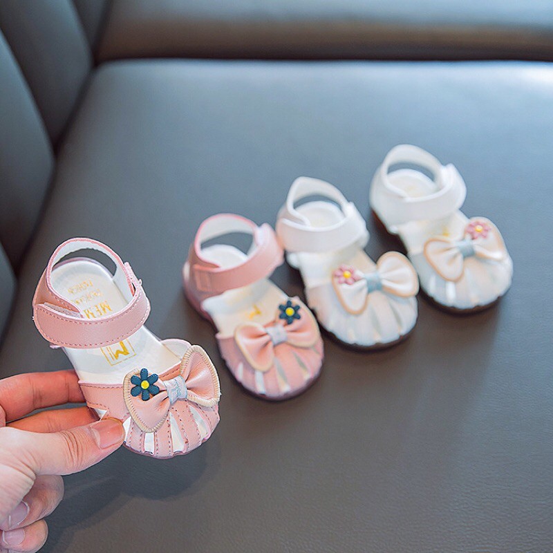 Sandal nơ dọ kèm bông hoa nhỏ mã K9938