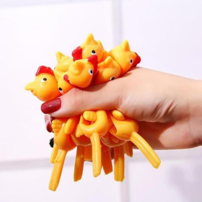sỉ vỉ 20 chiếc đồ chơi bắn rính hình con gà