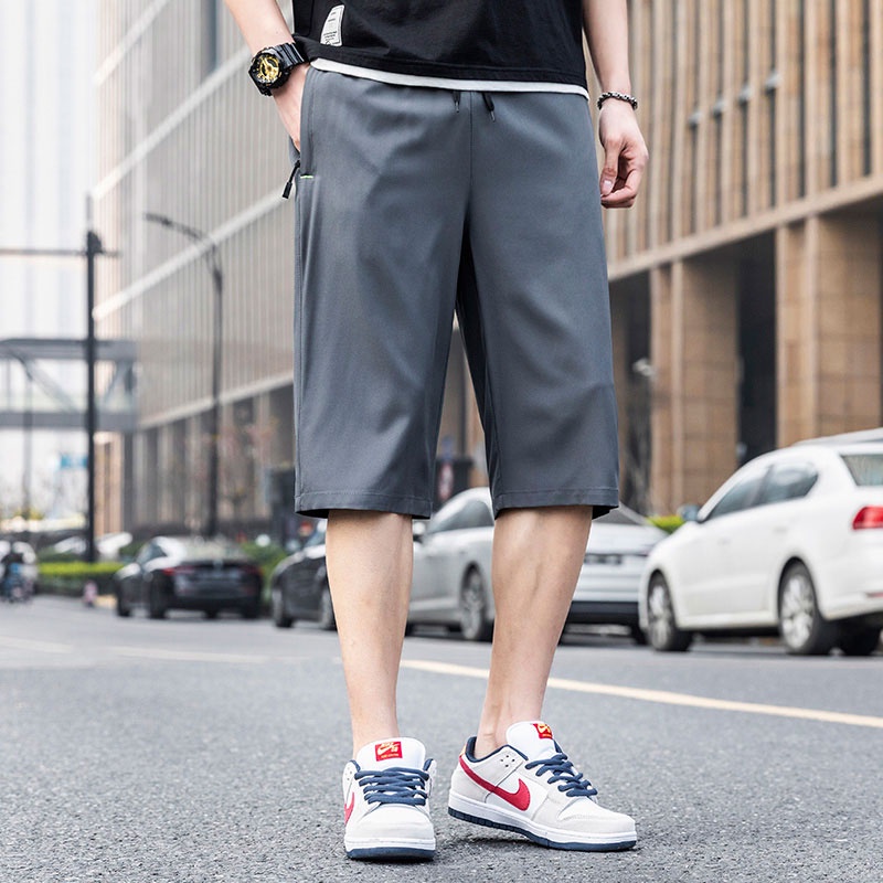 Quần Short Thể Thao Ống Rộng Màu Sắc Trơn Nhanh Khô Có Túi Khóa Kéo Thời Trang Mùa Hè Dành Cho Nam