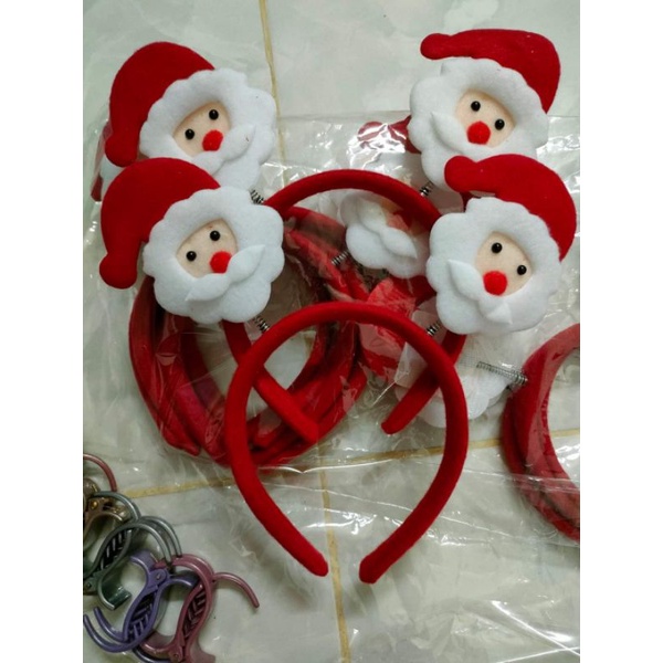 Cài tóc ông già noel cho bé