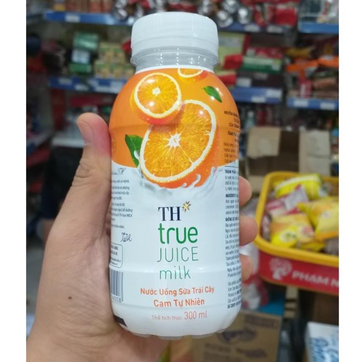Nước Uống Sữa Trái Cây Vị Cam /Dâu Của TH chai 330ml