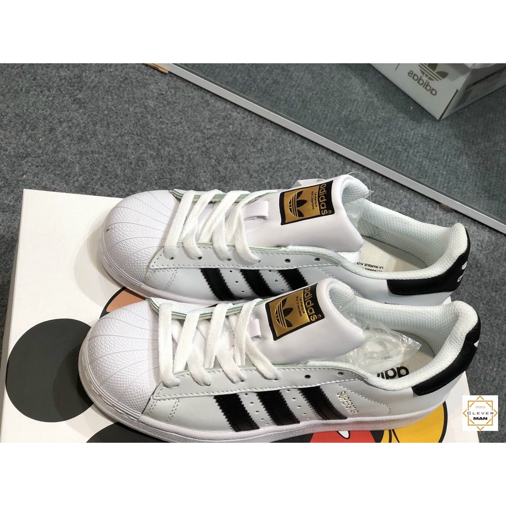 Giày thể thao SUPERSTAR Trắng vạch đen tem vàng, Sò tem Vàng
