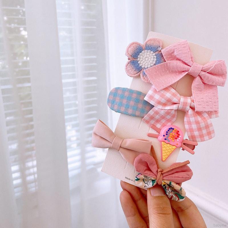 Kẹp tóc hình nơ màu kẹo ngọt ngào đáng yêu cho bé