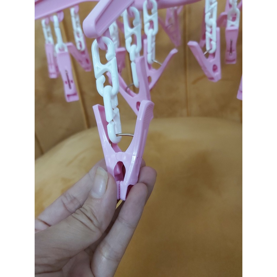 Móc dù xếp Duy Tân