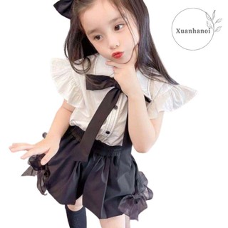 Bộ bé gái áo trắng và quần đùi bồng đen buộc nơ xinh XHN690