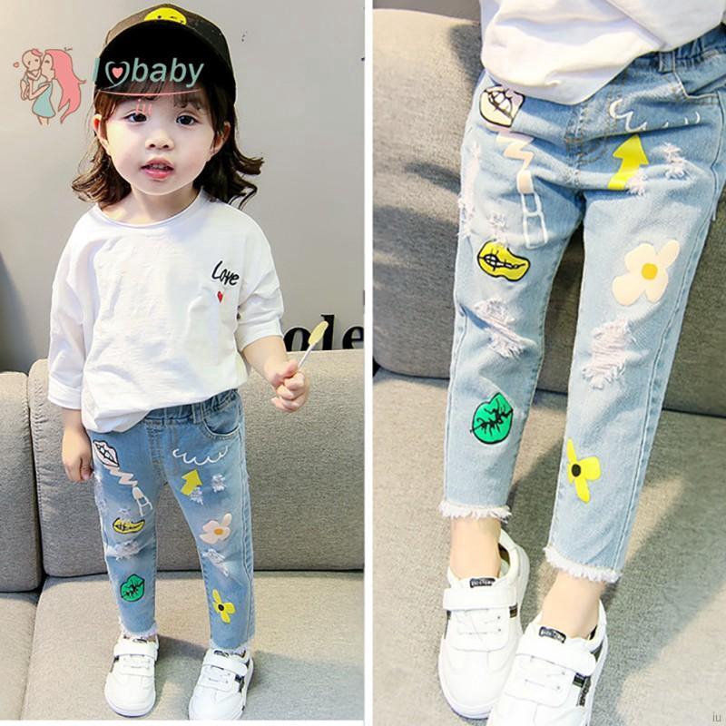 Quần jeans rách in hoạt hình cho bé gái