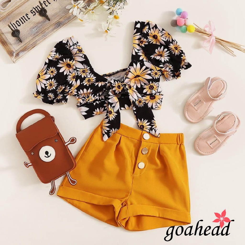 Set áo croptop họa tiết hoa cúc và quần short thời trang hè cho bé gái tập đi