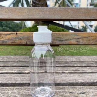 Chai nắp bật đựng dầu gội (mẫu mới, 50ml/100ml)