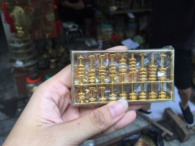 Bàn Tính Phong Thuỷ Buôn May Bán đắt