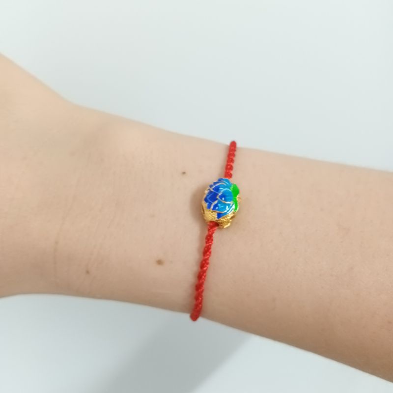 Vòng chỉ đỏ bông sen nepal xanh ngọc quyền năng bình an may mắn