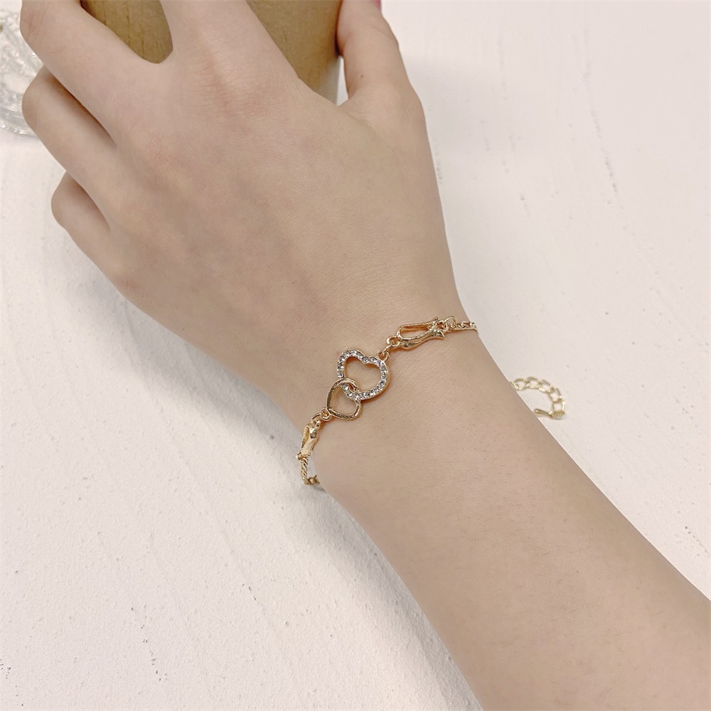 Vòng đeo tay mặt trái tim đính đá zircon xinh xắn thời trang dành cho nữ