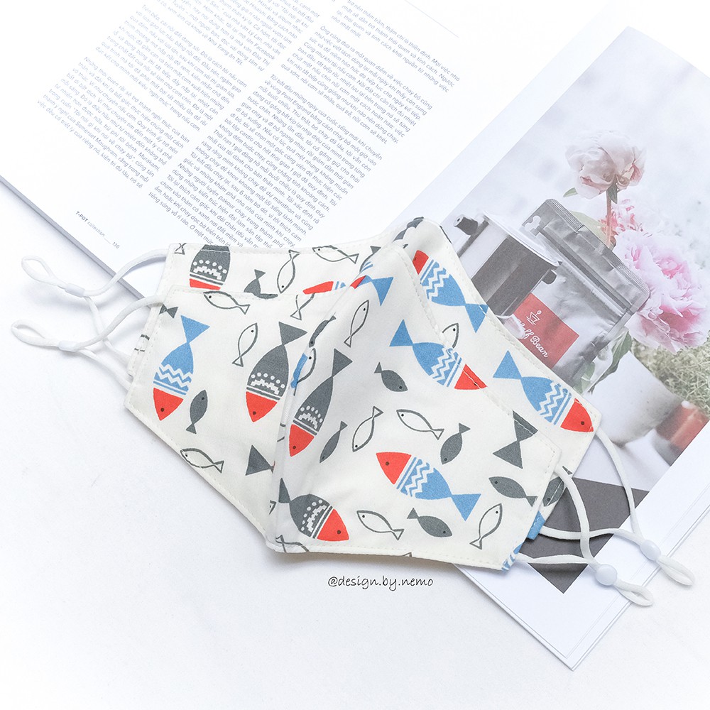 Khẩu Trang Vải Nemo Handmade Họa tiết Cá nền trắng nổi bật, có nút tăng giảm dây tiện lợi - KTCaNenTrang | BigBuy360 - bigbuy360.vn