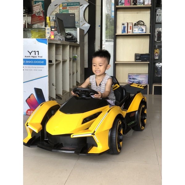 Xe ô tô điện trẻ em . ô tô điện trẻ em mẫu mới 2022 có đk từ xa , nhạc đèn ,dc12v