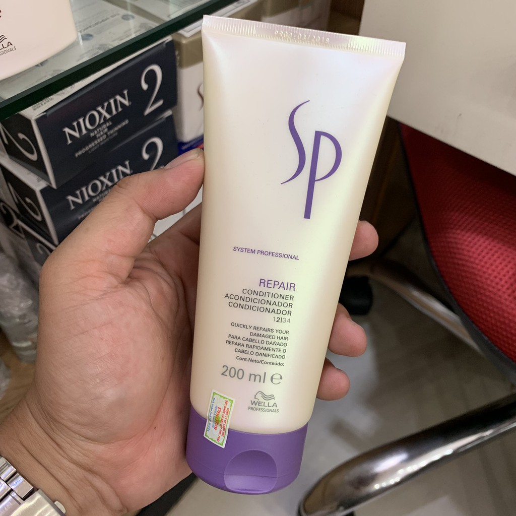 Dầu xả chăm sóc tóc hư tổn Sp Wella Repair Conditioner 200ml