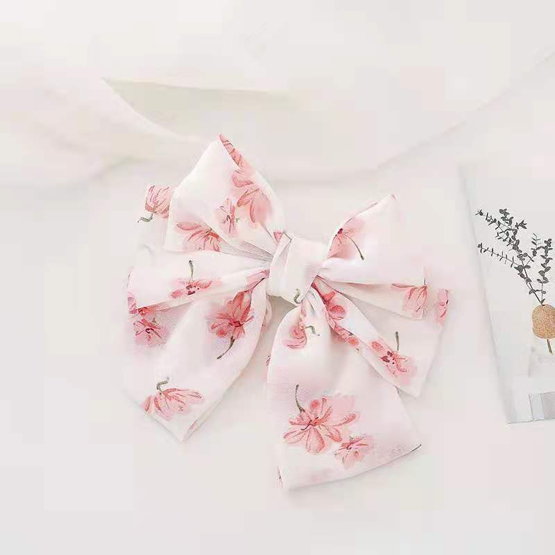 Kẹp tóc đính nơ phong cách Hàn Quốc ngọt ngào cho nữ