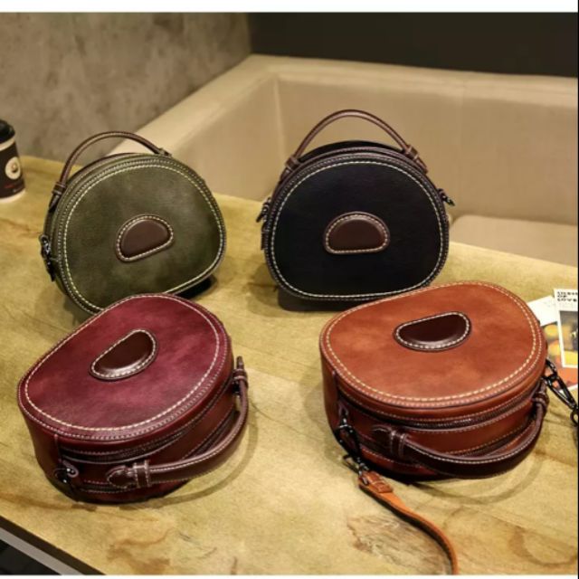 Túi hộp tròn da bò