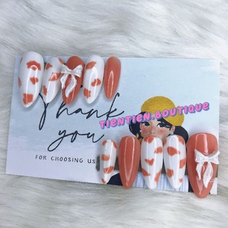 nail box thiết kế bò sữa nơ trắng