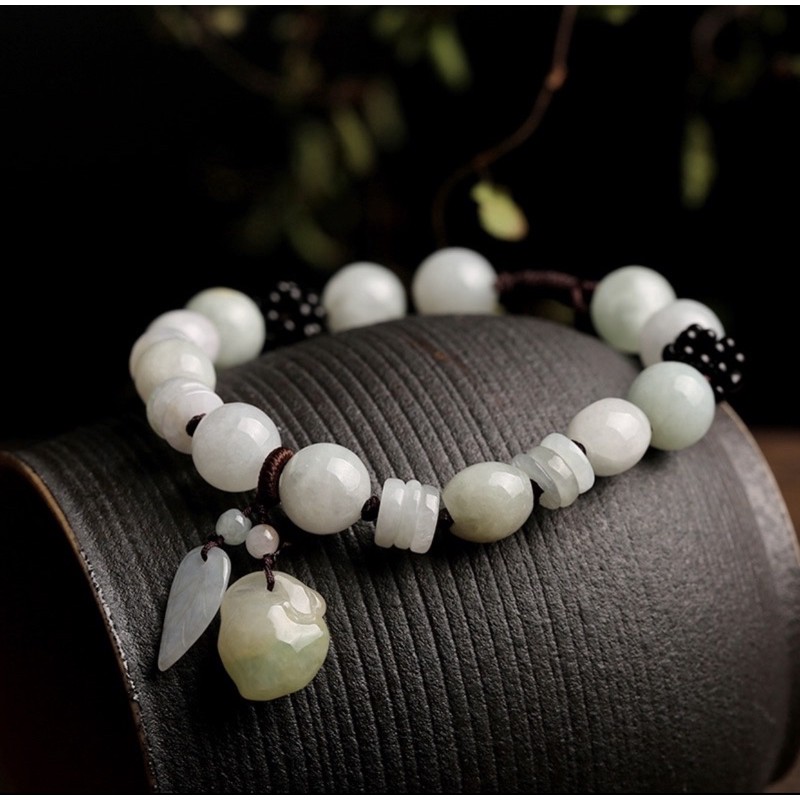 Vòng tay ngọc tự nhiên dây bện gắn charm