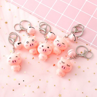Móc khóa kèm heo hồng kèm chuông nhỏ