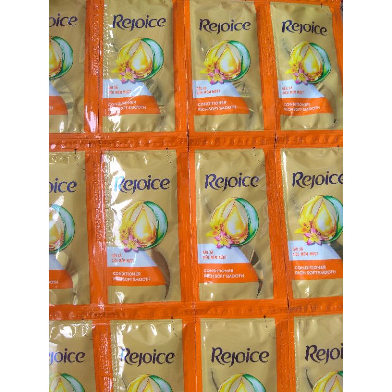 Dây 12 gói dầu xả Rejoice mềm mượt gói 6g