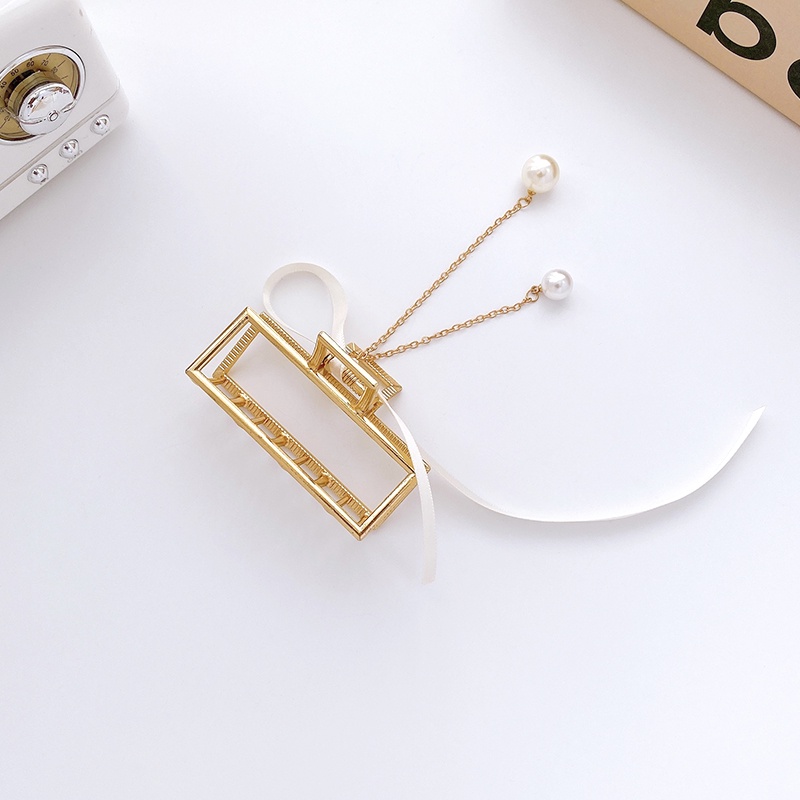 Kẹp tóc càng cua đính ngọc trai phối tua rua thời trang Hàn Quốc cho nữ